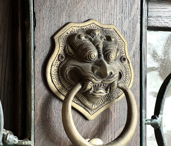 Löwenkopf an alter Haustüre, © TI Bitburger Land Löwenkopf an alter Haustüre, © TI Bitburger Land