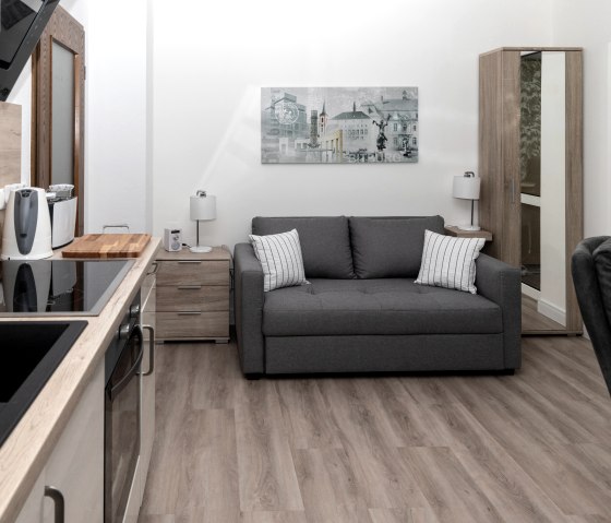 APT - canapé-lit confortable dans le salon, © Gerhard Müller APT - canapé-lit confortable dans le salon, © Gerhard Müller