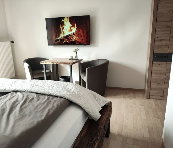 Gemütliche Sitzecke in allen Zimmern Gemütliche Sitzecke in allen Zimmern