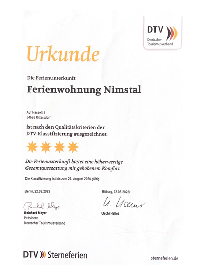 Een certificaat voor het vakantiehuis Nims tal in Riedenhof. De accommodatie is bekroond met vier sterren en biedt een hoog comfort.