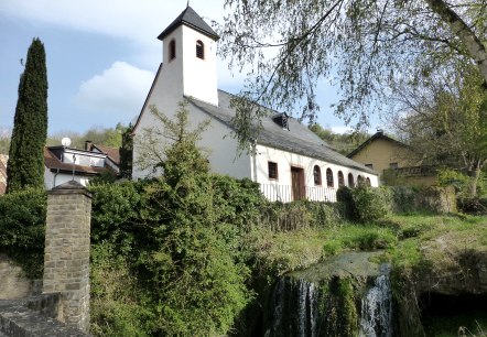 H&uuml;ttingen church and the village waterfall, &copy; NaturAktivErleben