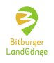 Bitburger LandGänge-logo met een groen en geel symbool dat een gestileerd landschap voorstelt en de woorden 'Bitburger LandGänge' eronder., © TI Bitburger Land