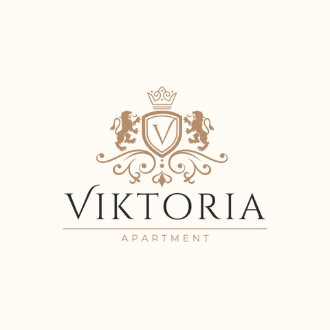An elegant logo for an apartment named Viktoria. It features a coat of arms with lions and a crown.